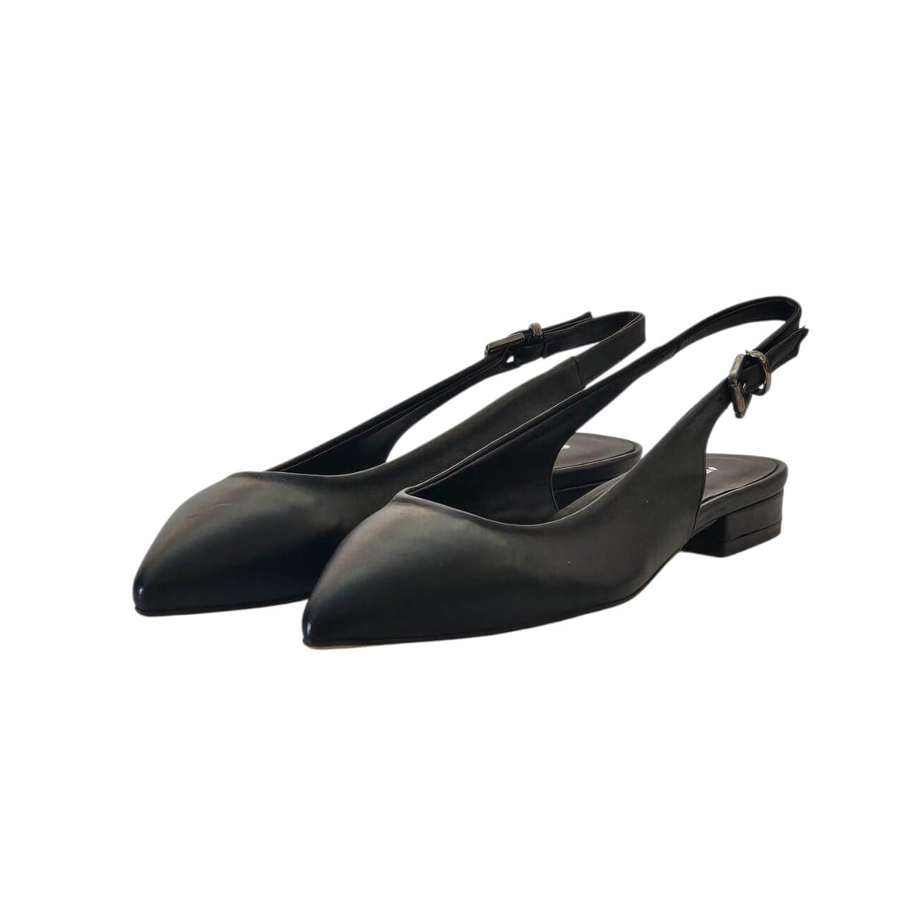 Pair of black pointed-toe slingback flats with a low block heel.