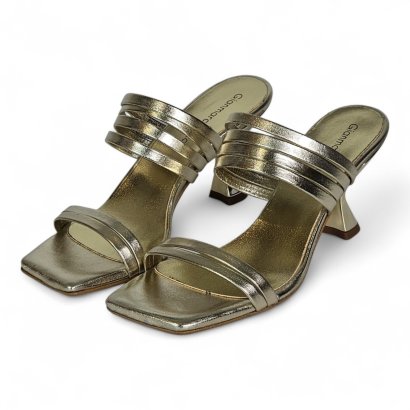 Gold metallic strappy sandals with a square toe and chunky heel on a white background.