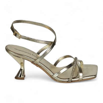 Gold metallic strappy sandal with ankle strap and small block heel, brand Gianmarco Ricci visible on the insole