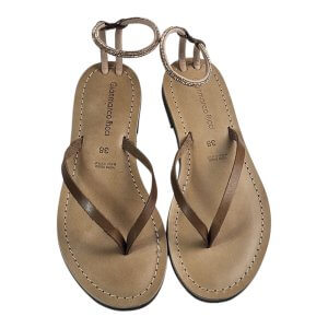 Brown leather sandals with a thong toe and beaded ankle straps, shown from above for product viewing.
