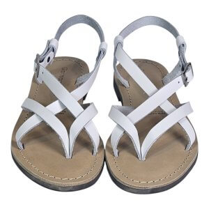 White strappy sandals with crisscross straps and buckled ankle strap, viewed from above for a product photo.