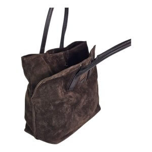 Brown suede tote bag with black leather straps and an open top, shown from a high angle on a white background